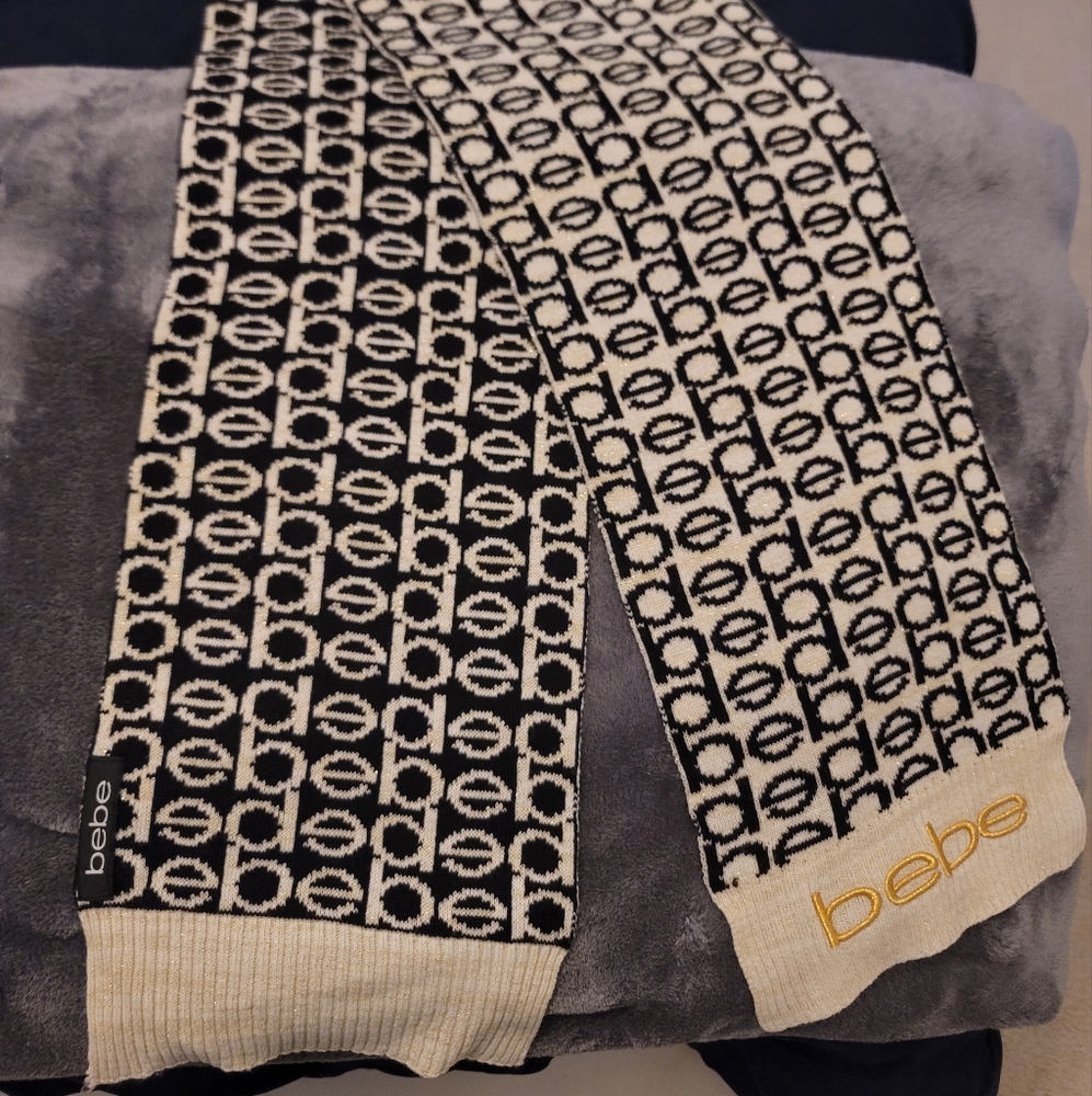 Bebe Black and Cream Geometric Knit Scarf With Gold Accent